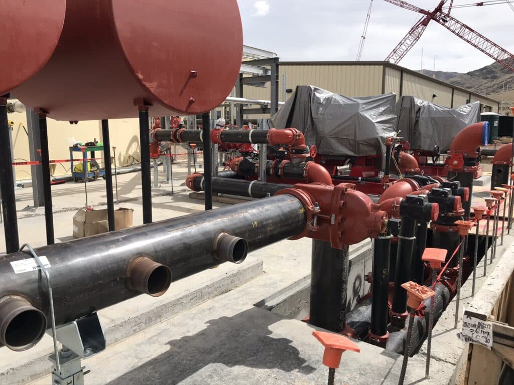 Pipes and tanks in industrial setting