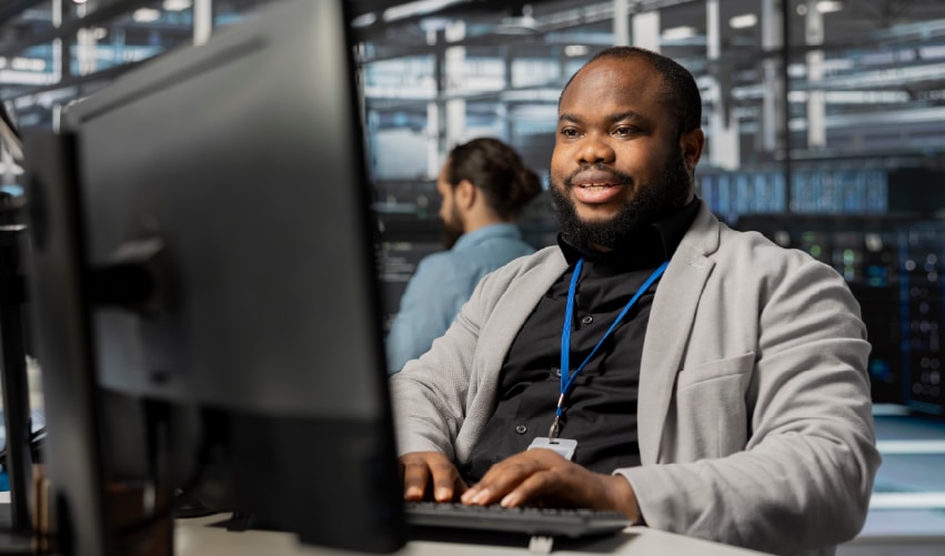 Person working at a computer station.