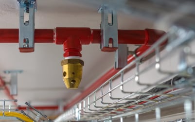 Red fire suppression piping and nozzle