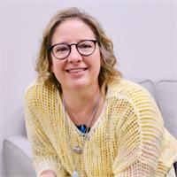 a professional headshot of Tanya Rice